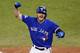 FILE- In this Oct. 19, 2015, file photo, Toronto Blue Jays' Josh Donaldson celebrates his two run home run against the Kansas City Royals during the third inning in Game 3 of baseball's American League Championship Series in Toronto. Cy Young Award winners Jake Arrieta of the Chicago Cubs and Dallas Keuchel of the Houston Astros were among 156 players who filed for salary arbitration Tuesday, Jan. 12, 2016, and are set to swap proposed figures with their teams this week unless they agree to contracts. Donaldson also filed. (AP Photo/Paul Sancya, File)