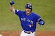 FILE- In this Oct. 19, 2015, file photo, Toronto Blue Jays' Josh Donaldson celebrates his two run home run against the Kansas City Royals during the third inning in Game 3 of baseball's American League Championship Series in Toronto. Cy Young Award winners Jake Arrieta of the Chicago Cubs and Dallas Keuchel of the Houston Astros were among 156 players who filed for salary arbitration Tuesday, Jan. 12, 2016, and are set to swap proposed figures with their teams this week unless they agree to contracts. Donaldson also filed. (AP Photo/Paul Sancya, File)