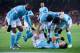 Manchester City's Argentinian striker Sergio Aguero (R) falls to the ground after hurting himself whilst scoring the opening goal of the English Premier League football match between Sunderland and Manchester City at the Stadium of Light in Sunderland, north east England on February 2, 2016. / AFP / OLI SCARFF (Photo credit should read OLI SCARFF/AFP/Getty Images)