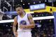 Jan 27, 2016; Oakland, CA, USA; Golden State Warriors guard Stephen Curry (30) holds stands on the floor before inbounding the ball against the Dallas Mavericks in the fourth quarter at Oracle Arena. The Warriors defeated the Mavericks 127-107. Mandatory Credit: Cary Edmondson-USA TODAY Sports