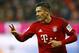 Bayern's Robert Lewandowski celebrates after scoring his side's second goal during the German Bundesliga soccer match between FC Bayern Munich and TSG 1899 Hoffenheim at the Allianz Arena stadium in Munich, Germany, Sunday, Jan. 31, 2016. (AP Photo/Matthias Schrader)
