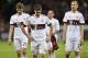 Bayern's Robert Lewandowski, center, Thomas Mueller, left, and Holger Badstuber leave the pitch disappointed after the German Bundesliga soccer match between Bayer Leverkusen and Bayern Munich in Leverkusen, Germany, Saturday, Feb. 6, 2016. The match ended 0-0. (AP Photo/Martin Meissner)