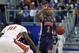 Jan 23, 2016; Gainesville, FL, USA; Auburn Tigers guard Kareem Canty (1) signals a play while being guarded by Florida Gators forward Dorian Finney-Smith (10) during the second half of a basketball game at Stephen C. O'Connell Center. Mandatory Credit: Reinhold Matay-USA TODAY Sports