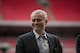 Former Chelsea manager Jose Mourinho smiles as he attends a group photo session pitchside as a guest of FIFA Presidential Candidate Gianni Infantino after unveiling his 90 day plan that he will implement if he is elected FIFA President, at Wembley Stadium in London, Monday, Feb. 1, 2016. (AP Photo/Matt Dunham)
