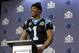 Carolina Panthers quarterback Cam Newton smiles as he fields questions during a press conference in preparation for the Super Bowl 50 football game Thursday Feb. 4, 2016 in San Jose, Calif. (AP Photo/Marcio Jose Sanchez)