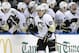 Pittsburgh Penguins center Sidney Crosby (87) celebrates with teammates after scoring against the Tampa Bay Lightning during the second period of an NHL hockey game Friday, Feb. 5, 2016, in Tampa, Fla. (AP Photo/Chris O'Meara)