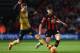Aaron Ramsey challenges for possession at the Vitality Stadium.