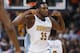 Denver Nuggets forward Kenneth Faried celebrates after scoring following an offensive rebound against the Chicago Bulls late in the second half of an NBA basketball game Friday, Feb. 5, 2016, in Denver. The Nuggets won 115-110. (AP Photo/David Zalubowski)