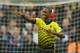Watford's Odion Ighalo celebrates scoring his side's third goal during the English Premier League soccer match between Watford and Liverpool at Vicarage Road stadium in Watford, Sunday, Dec. 20, 2015. (AP Photo/Matt Dunham)
