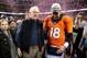 DENVER, CO - JANUARY 24: Peyton Manning #18 of the Denver Broncos and father Archie Manning walk off the field after defeating the New England Patriots in the AFC Championship game at Sports Authority Field at Mile High on January 24, 2016 in Denver, Colorado. The Broncos defeated the Patriots 20-18. (Photo by Doug Pensinger/Getty Images)