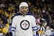 Winnipeg Jets defenseman Dustin Byfuglien plays against the Nashville Predators in the second period of an NHL hockey game Tuesday, Jan. 5, 2016, in Nashville, Tenn. (AP Photo/Mark Humphrey)