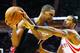 HOUSTON, TX - FEBRUARY 02: Chris Bosh #1 of the Miami Heat looks to drive with the basketball against Trevor Ariza #1 of the Houston Rockets during their game at the Toyota Center on February 2, 2016 in Houston, Texas. NOTE TO USER: User expressly acknowledges and agrees that, by downloading and or using this Photograph, user is consenting to the terms and conditions of the Getty Images License Agreement. (Photo by Scott Halleran/Getty Images)