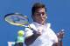 Nicolas Almagro of Spain makes a forehand return to Dominic Thiem of Austria during their second round match at the Australian Open tennis championships in Melbourne, Australia, Wednesday, Jan. 20, 2016.(AP Photo/Rafiq Maqbool)