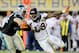 Denver Broncos’ Von Miller (58) makes an outside rush against the Carolina Panthers’ Mike Remmers (74) during the NFL Super Bowl 50 football game Sunday, Feb. 7, 2016, in Santa Clara, Calif. (AP Photo/Gregory Payan)