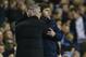 Tottenham manager Mauricio Pochettino, right, embraces Chelsea manager Jose Mourinho at the end of the English Premier League soccer match between Tottenham Hotspur and Chelsea at White Hart Lane Stadium in London, Thursday, Jan. 1, 2015. (AP Photo/Kirsty Wigglesworth)