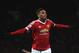 Manchester United's French striker Anthony Martial celebrates scoring their second goal during the English Premier League football match between Manchester United and Stoke City at Old Trafford in Manchester, north west England, on February 2, 2016. / AFP / PAUL ELLIS / RESTRICTED TO EDITORIAL USE. No use with unauthorized audio, video, data, fixture lists, club/league logos or 'live' services. Online in-match use limited to 75 images, no video emulation. No use in betting, games or single club/league/player publications. / (Photo credit should read PAUL ELLIS/AFP/Getty Images)