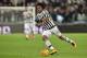 TURIN, ITALY - FEBRUARY 03: Juan Cuadrado of Juventus FC in action during the Serie A match between Juventus FC and Genoa CFC at Juventus Arena on February 3, 2016 in Turin, Italy. (Photo by Valerio Pennicino/Getty Images)