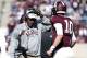 Texas A&M head coach Kevin Sumlin, left, greets quarterback Kyle Allen (10) at the sideline after the Aggies scored against Louisiana Monroe in the first half of an NCAA college football game, Saturday, Nov. 1, 2014, in College Station, Texas. (AP Photo/Tony Gutierrez)