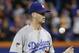 Los Angeles Dodgers pitcher Alex Wood (57) reacts after giving up a three-run home run to New York Mets' Yoenis Cespedes during the fourth inning of baseball's Game 3 of the National League Division Series, Monday, Oct. 12, 2015, in New York. (AP Photo/Julie Jacobson)