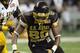 East player Drae Bowles (80) drops a a ball in front of West defender Ellis McCarthy during the third quarter of the U.S. Army All-American Bowl in San Antonio, Texas, Saturday Jan. 7, 2012. (AP Photo/Delcia Lopez)