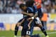 Real Madrid's Brazilian defender Danilo (L) is congratulated by Brazilian defender Marcelo after scoring a goal during the Spanish league football match Celta Vigo vs Real Madrid CF at the Balaidos stadium in Vigo on October 24, 2015. AFP PHOTO / MIGUEL RIOPA (Photo credit should read MIGUEL RIOPA/AFP/Getty Images)
