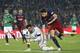 FC Barcelona's Marc Bartra, right, duels for the ball against Villanovense's goalkeeper Jose Fuentes during a Copa del Rey soccer match at the Camp Nou stadium in Barcelona, Spain, Wednesday, Dec. 2, 2015. (AP Photo/Manu Fernandez)