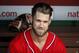 Washington Nationals right fielder Bryce Harper (34) sits in the dugout before a baseball game against the Miami Marlins at Nationals Park, Saturday, Aug. 29, 2015, in Washington. (AP Photo/Alex Brandon)
