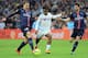 Marseille's Michy Batshuayi, center, challenges for the ball with Paris Saint Germain's Zlatan Ibrahimovic, left, and Thiago Motta, during the League One soccer match between Marseille and Paris Saint-Germain, at the Velodrome Stadium, in Marseille, southern France, Sunday, Feb. 7, 2016. (AP Photo/Claude Paris)