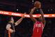 February 9, 2016; Oakland, CA, USA; Houston Rockets forward Trevor Ariza (1) shoots the basketball against Golden State Warriors center Andrew Bogut (12) during the first quarter at Oracle Arena. Mandatory Credit: Kyle Terada-USA TODAY Sports
