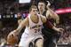 Cleveland Cavaliers' Timofey Mozgov (20), from Russia, drives past Phoenix Suns’ Alex Len (21), from Ukraine, during the second half of an NBA basketball game Wednesday, Jan. 27, 2016, in Cleveland. The Cavaliers won 115-93. (AP Photo/Tony Dejak)
