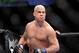 Tito Ortiz eyes his opponent, Forrest Griffin before his UFC 148 light heavyweight fight Saturday, July 7, 2012, in Las Vegas. Griffin won the bout by a unanimous decision. (AP Photo/David Becker)