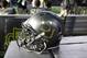 A Baylor helmet is placed along the team bench area during an NCAA college football game against Texas Tech Saturday, Oct. 3, 2015, in Arlington, Texas. (AP Photo/Roger Steinman)