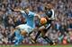 MANCHESTER, ENGLAND - FEBRUARY 06: Sergio Aguero of Manchester City and Danny Simpson of Leicester City during the Barclays Premier League match between Manchester City and Leicester City at the Etihad Stadium on February 06, 2016 in Manchester, England. (Photo by Matthew Ashton - AMA/Getty Images)