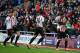 Sunderland's French-born Tunisian midfielder Wahbi Khazri (R) celebrates scoring his team's first goal with teammates during the English Premier League football match between Sunderland and Manchester United at the Stadium of Light in Sunderland, northeast England on February 13, 2016. / AFP / OLI SCARFF / RESTRICTED TO EDITORIAL USE. No use with unauthorized audio, video, data, fixture lists, club/league logos or 'live' services. Online in-match use limited to 75 images, no video emulation. No use in betting, games or single club/league/player publications. / (Photo credit should read OLI SCARFF/AFP/Getty Images)