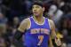New York Knicks forward Carmelo Anthony walks up court during the second half of an NBA basketball game against the Detroit Pistons, Thursday, Feb. 4, 2016 in Auburn Hills, Mich. (AP Photo/Carlos Osorio)