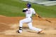 Oct 30, 2015; New York City, NY, USA; New York Mets center fielder Yoenis Cespedes drives in a run with a sacrifice fly against the Kansas City Royals in the 6th inning in game three of the World Series at Citi Field. Mandatory Credit: Brad Penner-USA TODAY Sports