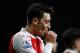Arsenal's German midfielder Mesut Ozil celebrates after scoring their second goal during the English Premier League football match between Arsenal and Bournemouth at the Emirates Stadium in London on December 28, 2015. / AFP / ADRIAN DENNIS (Photo credit should read ADRIAN DENNIS/AFP/Getty Images)