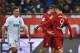 TOPSHOT - Bayern Munich's Polish striker Robert Lewandowski (R) and Bayern Munich's striker Thomas Mueller celebrate after Lewandowski scored the 0-1 goal next to Augsburg's defender Max Philipp (L) during the German first division Bundesliga football match of FC Augsburg vs FC Bayern Munich in Augsburg, southern Germany, on February 14, 2016. / AFP / CHRISTOF STACHE / RESTRICTIONS: DURING MATCH TIME: DFL RULES TO LIMIT THE ONLINE USAGE TO 15 PICTURES PER MATCH AND FORBID IMAGE SEQUENCES TO SIMULATE VIDEO. == RESTRICTED TO EDITORIAL USE == FOR FURTHER QUERIES PLEASE CONTACT DFL DIRECTLY AT + 49 69 650050
(Photo credit should read CHRISTOF STACHE/AFP/Getty Images)