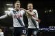 Tottenham's Christian Eriksen, left, celebrates with Harry Kane after scoring his side’s second goal during the English Premier League soccer match between Manchester City and Tottenham Hotspur's at the Etihad Stadium in Manchester, England, Sunday Feb. 14, 2016. (AP Photo/Jon Super)