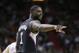 Los Angeles Clippers guard Chris Paul acknowledges a fan during the first half of an NBA basketball game against the Miami Heat, Sunday, Feb. 7, 2016, in Miami. (AP Photo/Lynne Sladky)