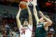 LOUISVILLE, KY - DECEMBER 23: Anas Mahmoud #14 of the Louisville Cardinals shoots the ball during the game against the Utah Valley Wolverines in the Billy Minardi Classic at KFC YUM! Center on December 23, 2015 in Louisville, Kentucky. (Photo by Andy Lyons/Getty Images)