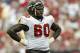 TAMPA, FL - OCTOBER 13: Guard Cosey Coleman #60 of the Tampa Bay Buccaneers stands on the field during the NFL game against the Cleveland Browns on October 13, 2002 at Raymond James Stadium in Tampa, Florida. The Buccaneers won 17-3. (Photo by Andy Lyons/Getty Images)