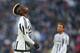 Juventus' midfielder Paul Pogba from France reacts during the Italian Serie A football match Juventus Vs Hellas Verona on January 6, 2016 at the 'Juventus Stadium' in Turin. AFP PHOTO / MARCO BERTORELLO / AFP / MARCO BERTORELLO (Photo credit should read MARCO BERTORELLO/AFP/Getty Images)