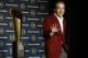 Alabama head coach Nick Saban poses with the championship trophy during a news conference for the NCAA college football playoff championship Tuesday, Jan. 12, 2016, in Scottsdale, Ariz. Alabama beat Clemson 45-40 to win the championship. (AP Photo/Morry Gash)
