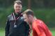 Manchester United's Dutch manager Louis van Gaal (L) watches English striker Wayne Rooney (R) work during a training session their Carrington facility in Manchester, north west England on October 20, 2015 ahead of their Champions League football match against CSKA Moscow on October 21. AFP PHOTO / PAUL ELLIS (Photo credit should read PAUL ELLIS/AFP/Getty Images)