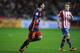 GIJON, SPAIN - FEBRUARY 17: Lionel Messi of FC Barcelona celebrates after scoring his team's opening goal during the La Liga match between Sporting Gijon and FC Barcelona at Estadio El Molinon on February 17, 2016 in Gijon, Spain. (Photo by Denis Doyle/Getty Images)