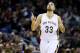 New Orleans Pelicans forward Ryan Anderson (33) reacts after scoring during the first half of an NBA basketball game against the Milwaukee Bucks Saturday, Jan. 23, 2016, in New Orleans. (AP Photo/Jonathan Bachman)