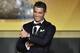 Real Madrid and Portugal's forward Cristiano Ronaldo gestures on stage during the 2015 FIFA Ballon d'Or award ceremony at the Kongresshaus in Zurich on January 11, 2016. AFP PHOTO / FABRICE COFFRINI / AFP / FABRICE COFFRINI (Photo credit should read FABRICE COFFRINI/AFP/Getty Images)