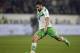Wolfsburg's Ricardo Rodriguez plays the ball during the German Bundesliga soccer match between VfL Wolfsburg and and Bayer 04 Leverkusen in Wolfsburg, Germany, Saturday, Oct. 31, 2015. (AP Photo/Michael Sohn)