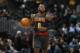 Atlanta Hawks guard Shelvin Mack (8) in the second half of an NBA basketball game Monday, Jan. 25, 2016, in Denver. The Hawks won 119-105. (AP Photo/David Zalubowski)